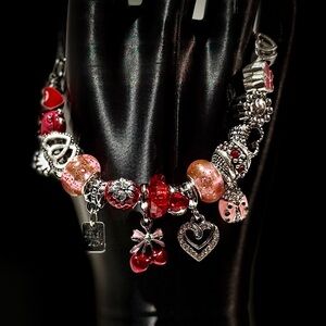 Charming Silver and Pink Charm Bracelet